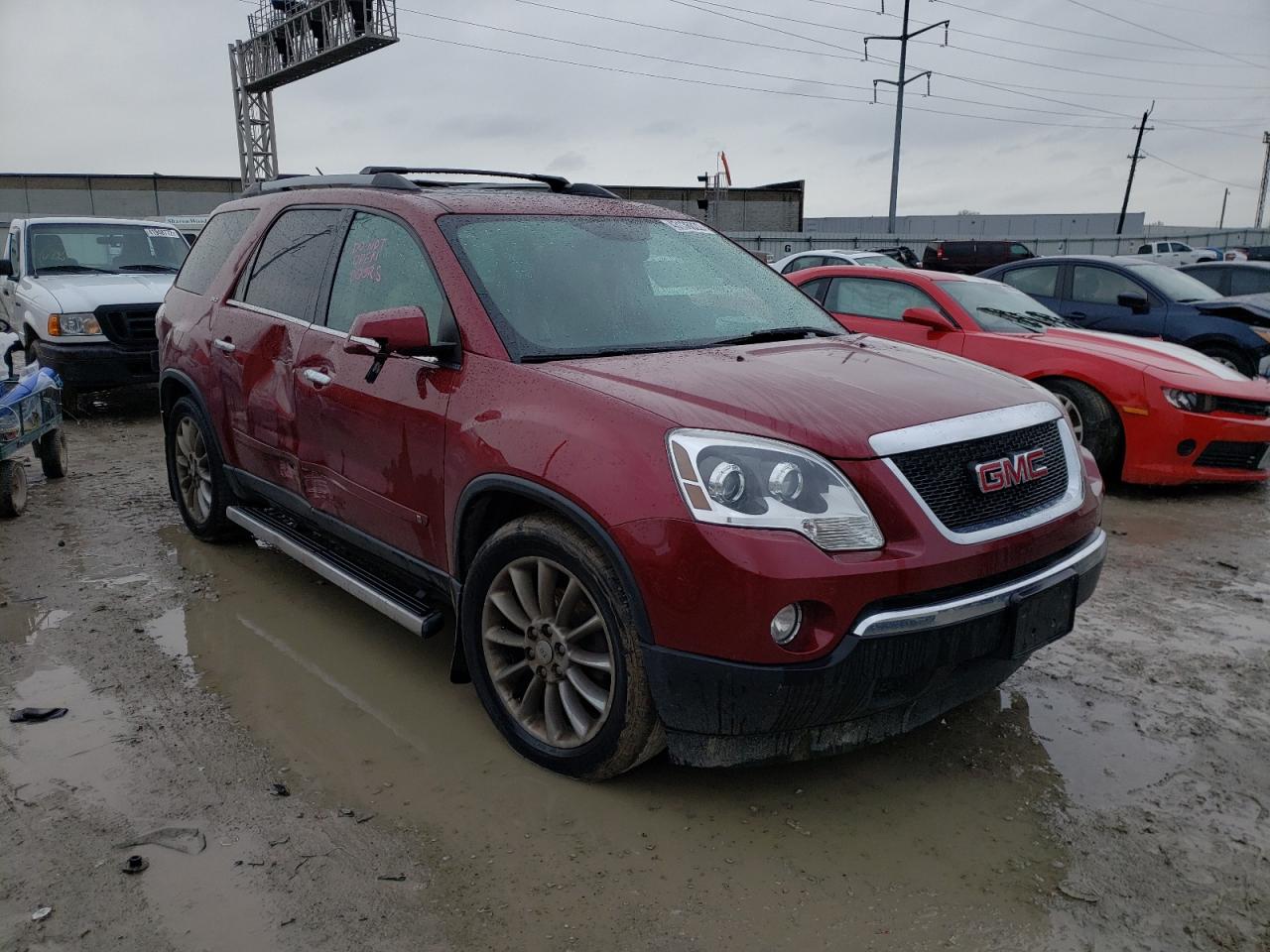 GMC ACADIA SLT 2010 with VIN 1GKLVMED9AJ176272 - Photo from auction