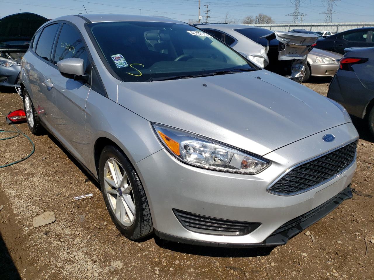 Photo 1 from auction – 2018 FORD FOCUS SE with VIN 1FADP3K27JL250998