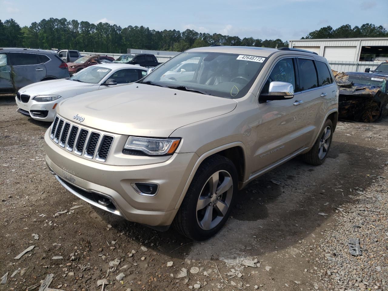 Photo 2 from auction – 2014 JEEP GRAND CHER with VIN 1C4RJECG0EC449517