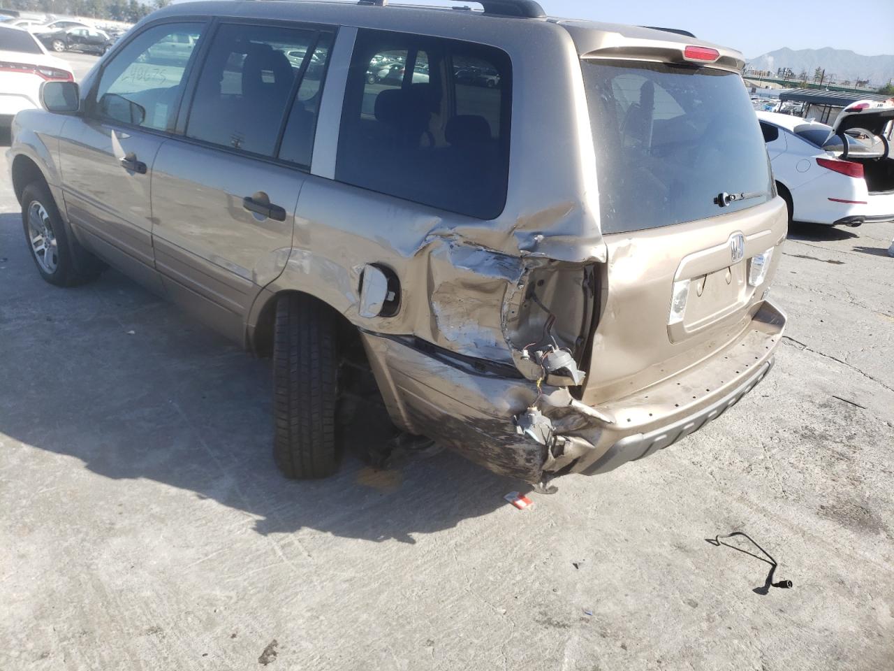 Photo 9 from auction – 2003 HONDA PILOT EX with VIN 2HKYF18433H519288