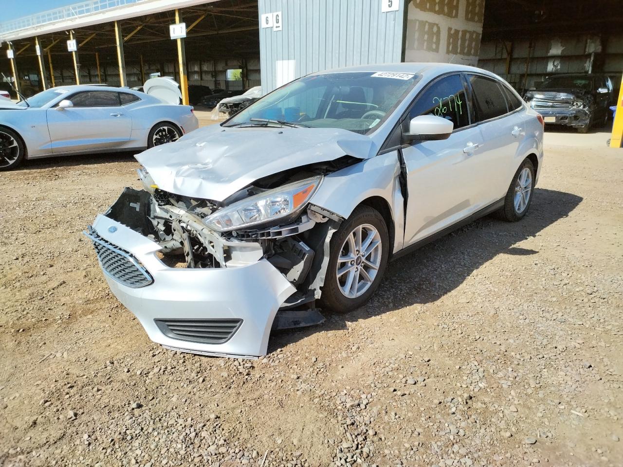 Photo 2 from auction – 2018 FORD FOCUS SE with VIN 1FADP3F2XJL230707