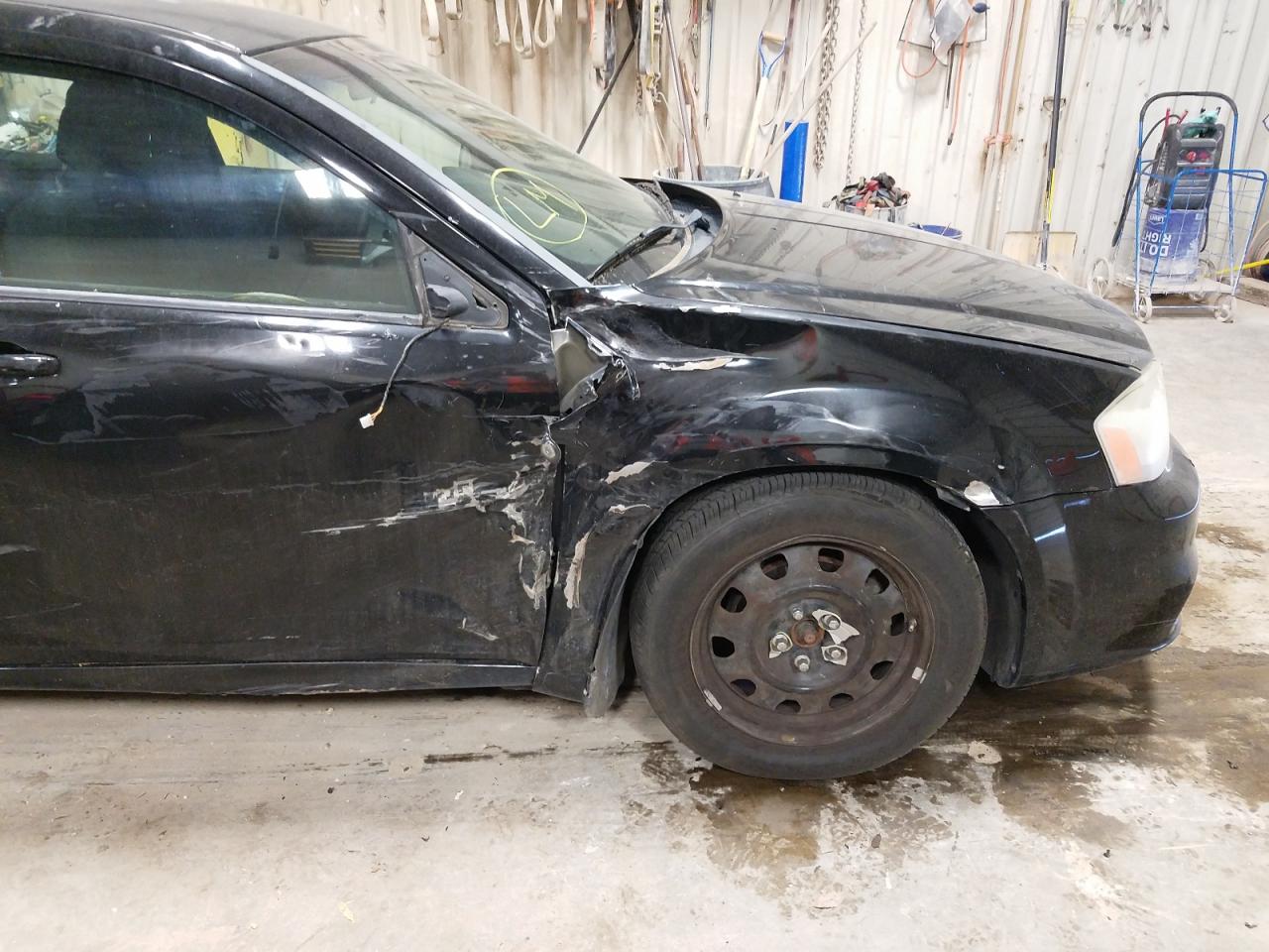 Photo 9 from auction – 2012 DODGE AVENGER SE with VIN 1C3CDZAB0CN215959