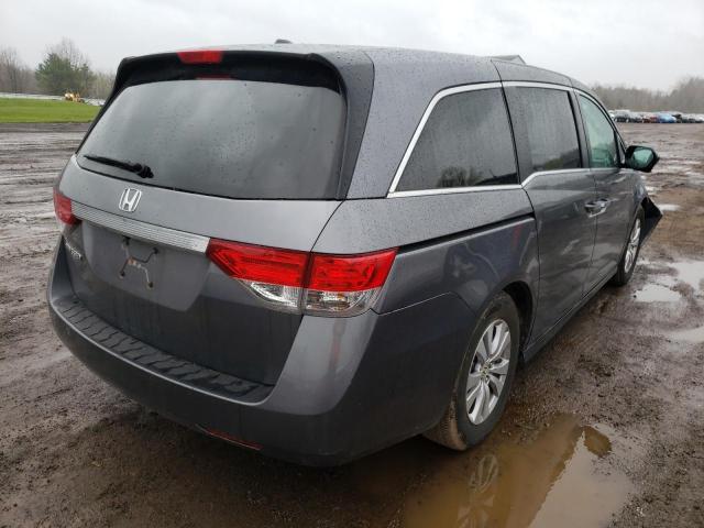 Photo 4 from auction – 2014 HONDA ODYSSEY EX with VIN 5FNRL5H64EB023083