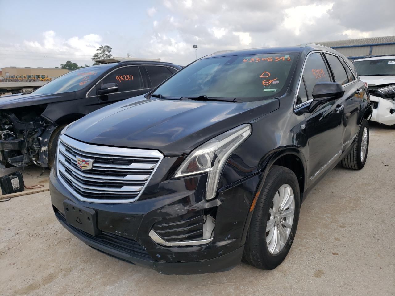 Photo 2 from auction – 2017 CADILLAC XT5 with VIN 1GYKNARS0HZ321199