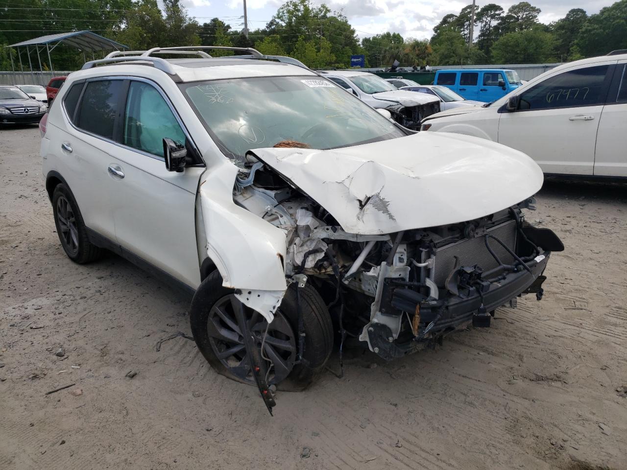 NISSAN ROGUE S 2016 with VIN 5N1AT2MTXGC912974 - Photo from auction