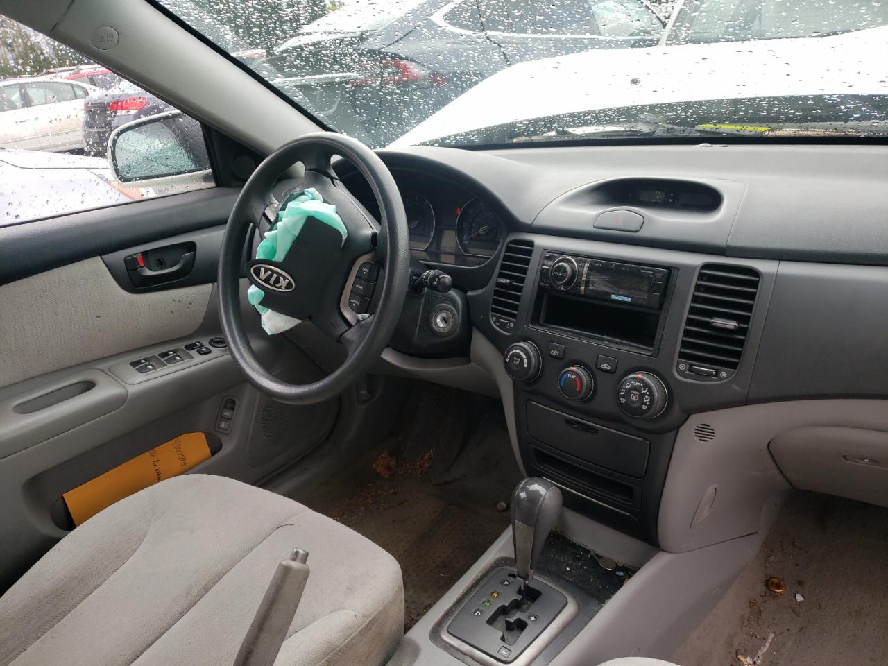 Photo 9 from auction – 2006 KIA OPTIMA LX with VIN KNAGE124X65014163
