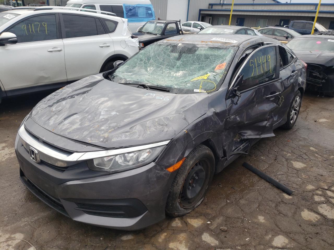 Photo 2 from auction – 2017 HONDA CIVIC LX with VIN 2HGFC2F51HH512469