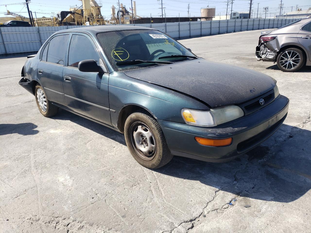 TOYOTA COROLLA BA 1997 with VIN 1NXBA02E9VZ573330 - Photo from auction