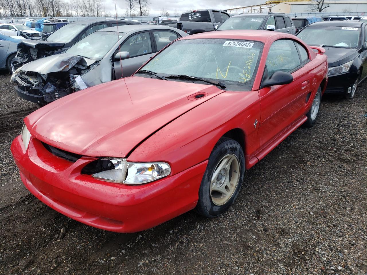Photo 2 from auction – 1997 FORD MUSTANG with VIN 1FALP4043VF176554