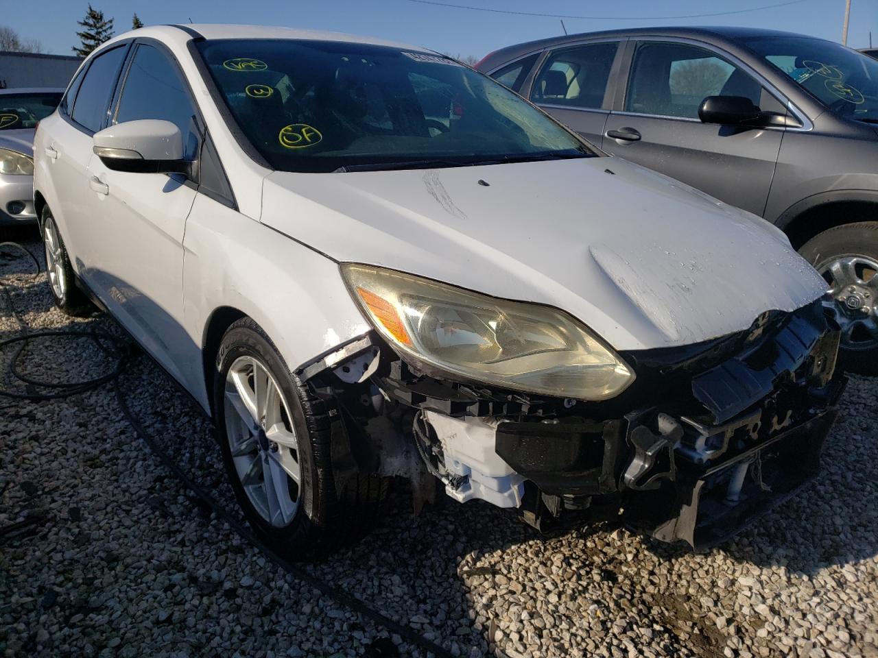 FORD FOCUS SE 2016 with VIN 1FADP3F26GL214092 - Photo from auction