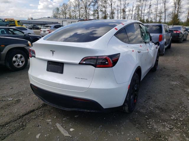 Photo 7 from auction – 2021 TESLA MODEL Y with VIN 5YJYGDEEXMF095572