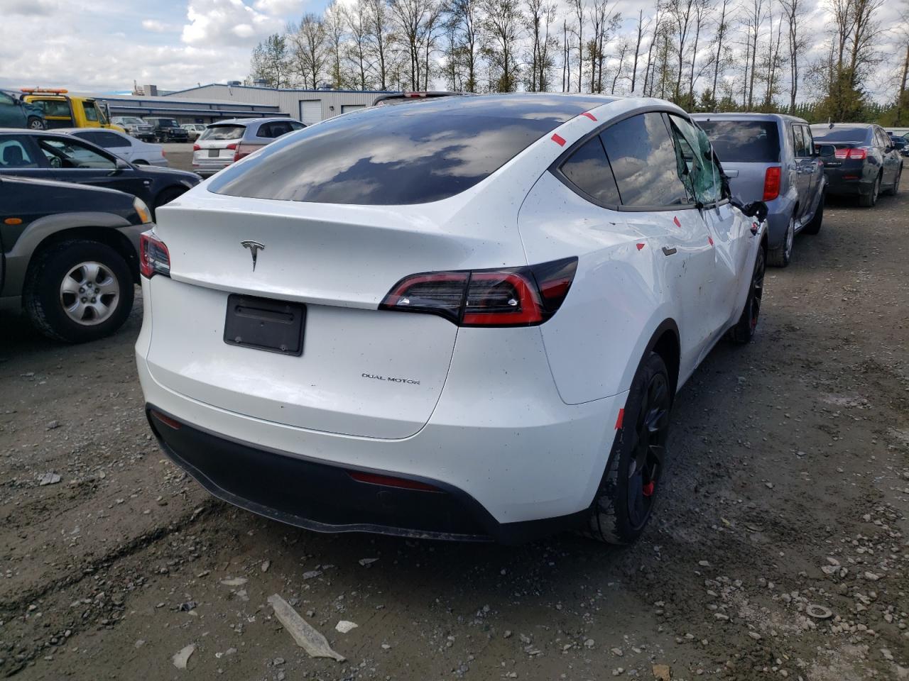 Photo 17 from auction – 2021 TESLA MODEL Y with VIN 5YJYGDEEXMF095572
