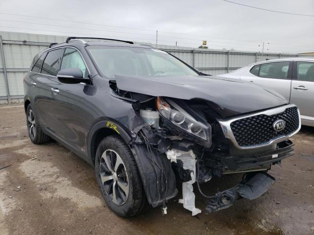 KIA SORENTO EX 2016 with VIN 5XYPHDA13GG040034 - Photo from auction