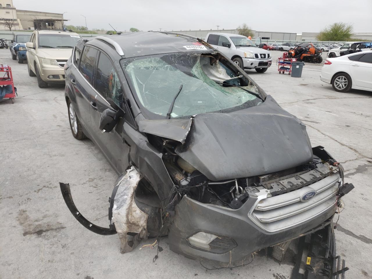 Photo 18 from auction – 2017 FORD ESCAPE TIT with VIN 1FMCU0J97HUC34067