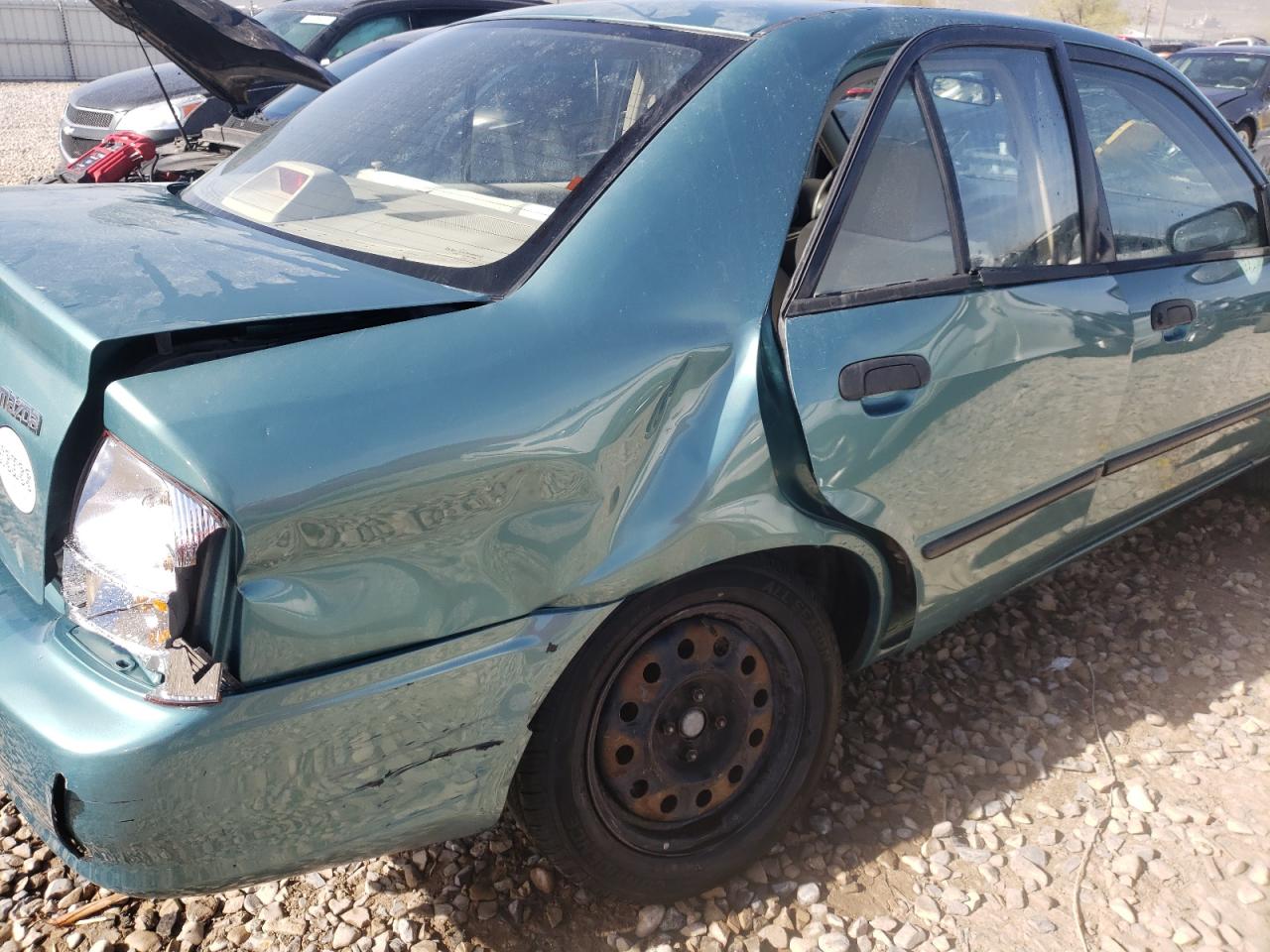Photo 9 from auction – 2002 MAZDA PROTEGE DX with VIN JM1BJ225021606535