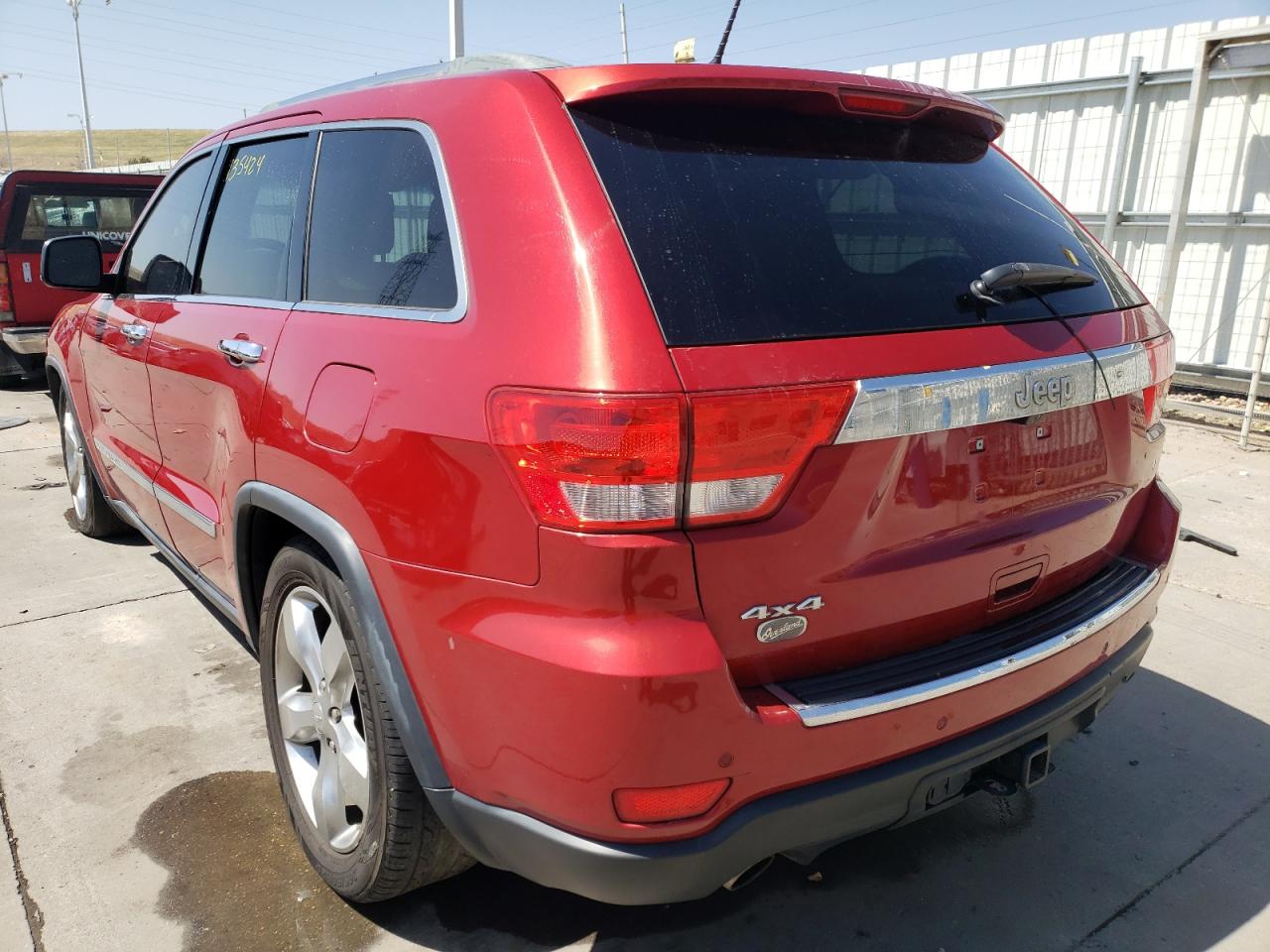 Photo 16 from auction – 2011 JEEP GRAND CHER with VIN 1J4RR6GT2BC686652