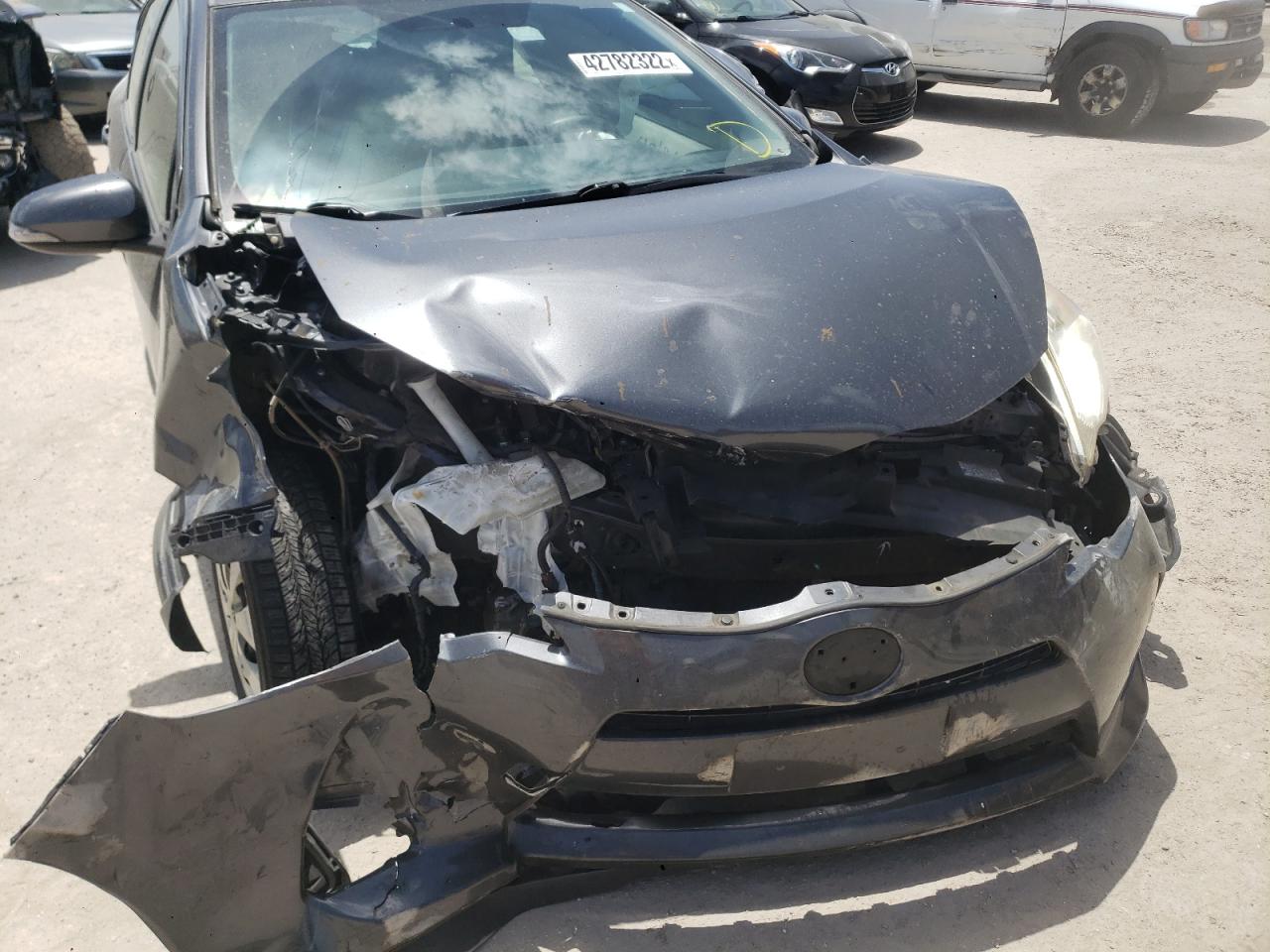Photo 9 from auction – 2014 TOYOTA PRIUS C with VIN JTDKDTB38E1566933