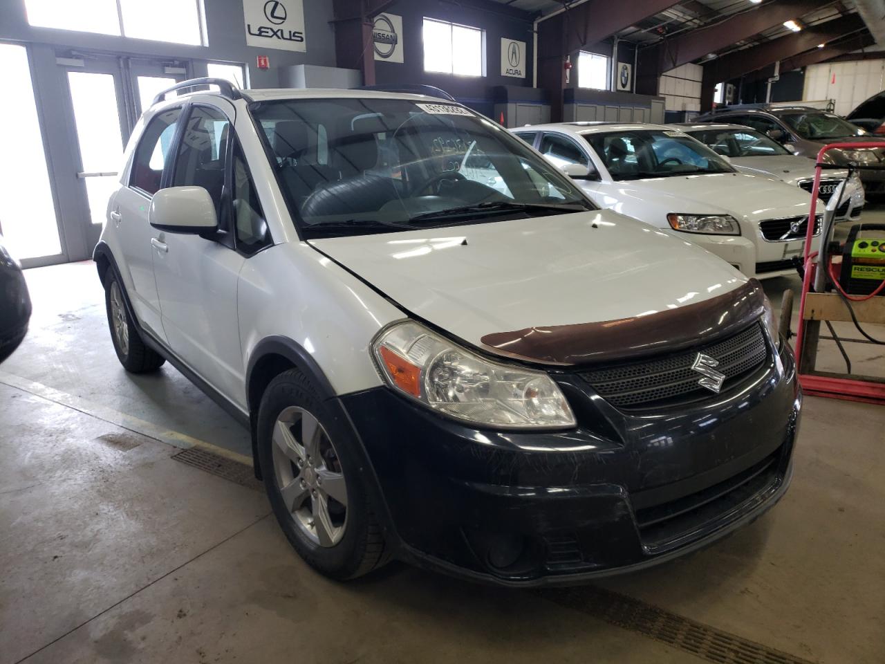 SUZUKI SX4 2012 with VIN JS2YB5A30C6306805 - Photo from auction