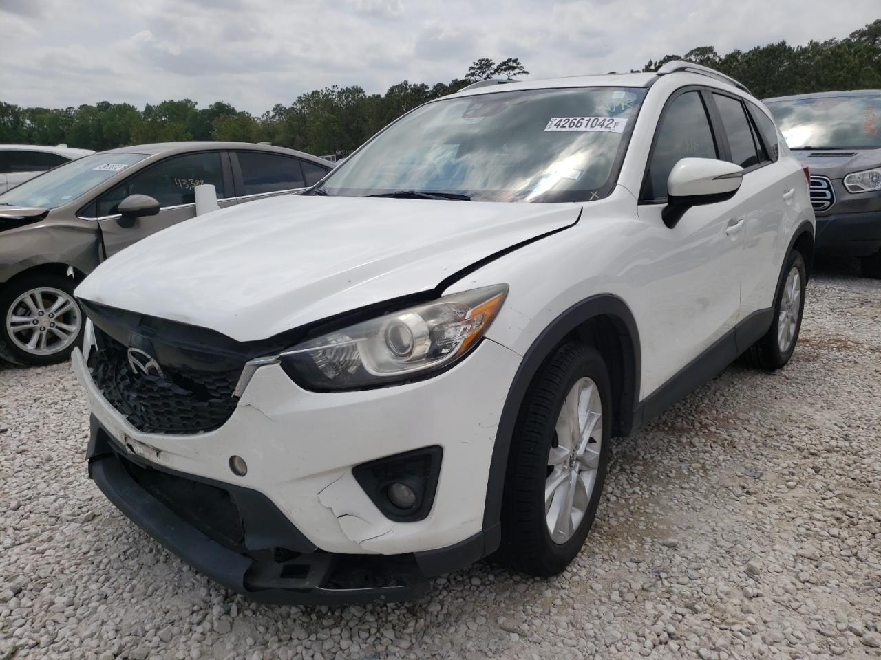 Photo 2 from auction – 2015 MAZDA CX-5 GT with VIN JM3KE2DY2F0483870