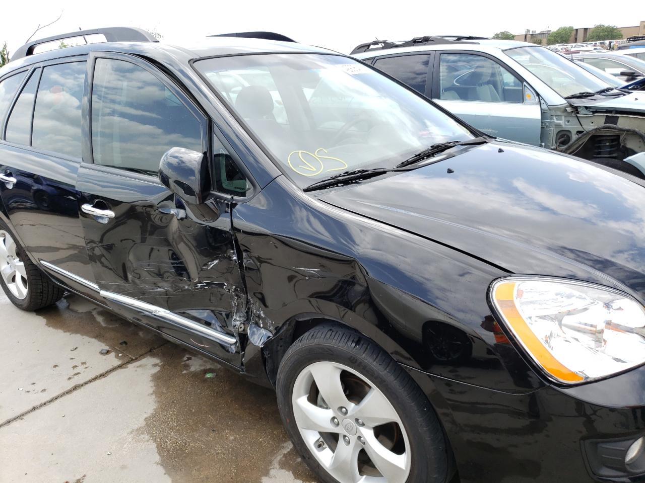Photo 9 from auction – 2009 KIA RONDO LX with VIN KNAFG526097278970