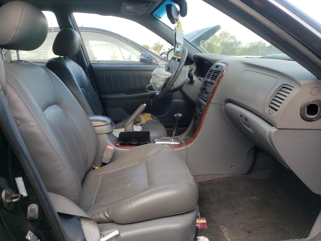 Photo 5 from auction – 2006 KIA OPTIMA with VIN KNAGD128765440334