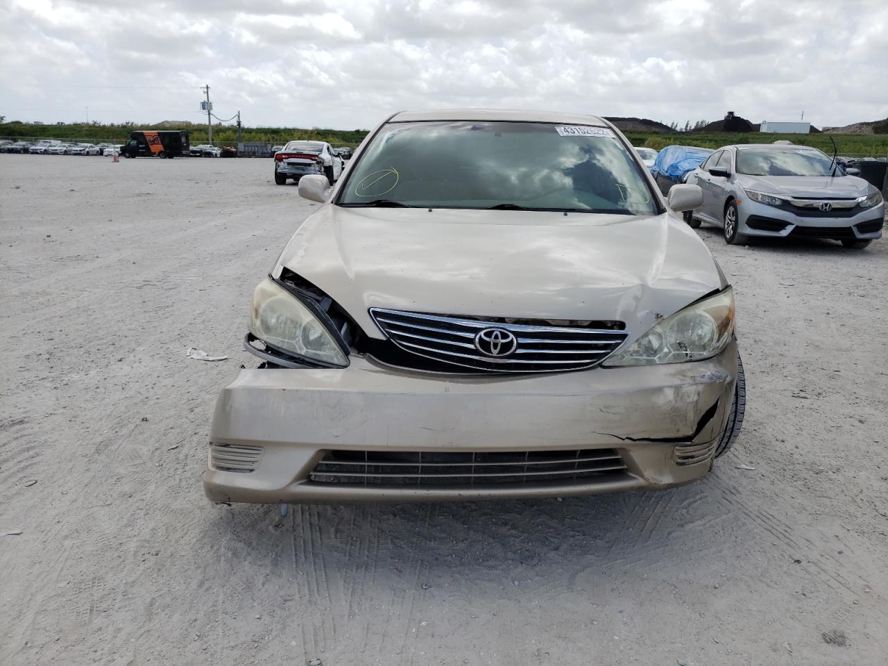 Photo 9 from auction – 2002 TOYOTA CAMRY LE with VIN JTDBE32K720013034