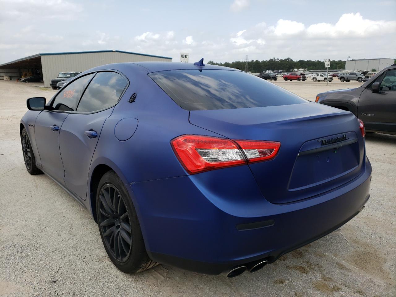 Photo 3 from auction – 2014 MASERATI GHIBLI with VIN ZAM57XSA7E1088736