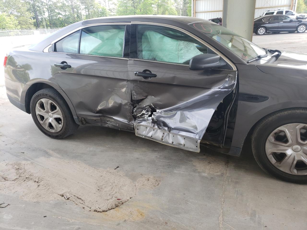 Photo 9 from auction – 2013 FORD TAURUS POL with VIN 1FAHP2MK2DG202038