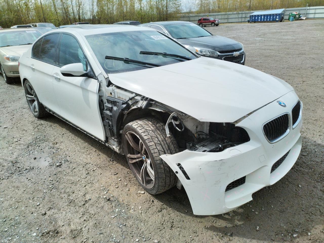 BMW M5 2013 with VIN WBSFV9C54DD095824 - Photo from auction