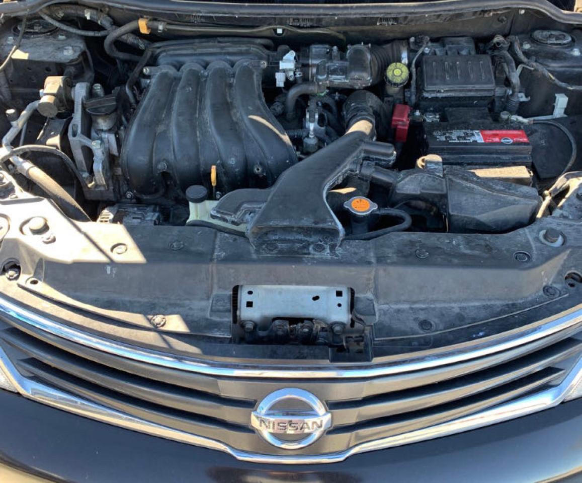 Photo 7 from auction – 2012 NISSAN VERSA S with VIN 3N1BC1CP4CL358789
