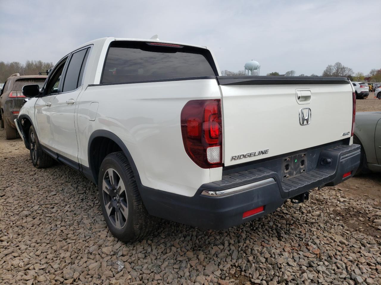 Photo 3 from auction – 2017 HONDA RIDGELINE with VIN 5FPYK3F59HB024898