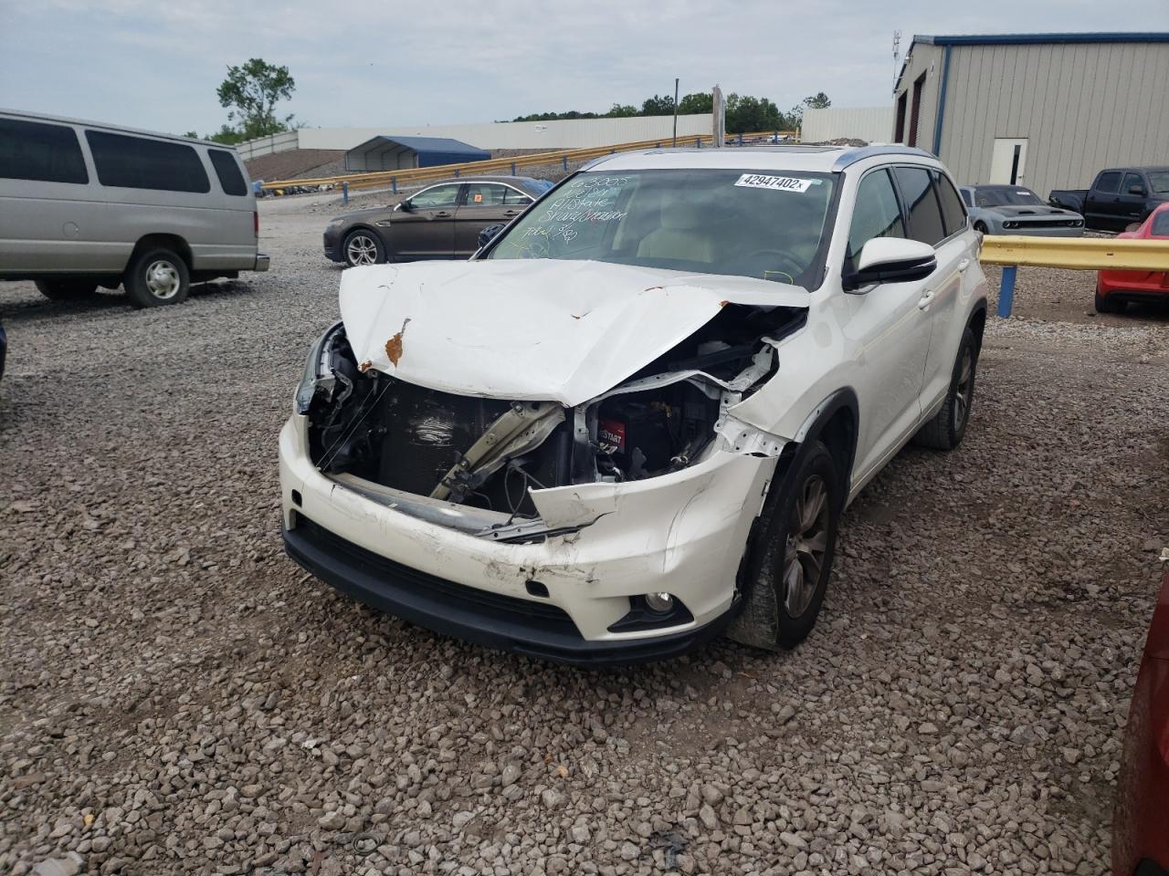 Photo 2 from auction – 2015 TOYOTA HIGHLANDER with VIN 5TDKKRFH7FS058536