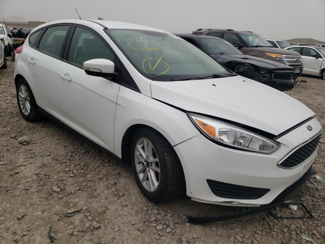FORD FOCUS SE 2015 with VIN 1FADP3K25FL336396 - Photo from auction