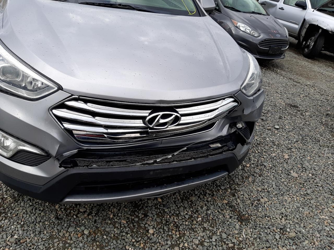 Photo 9 from auction – 2016 HYUNDAI SANTA FE S with VIN KM8SMDHF2GU161994