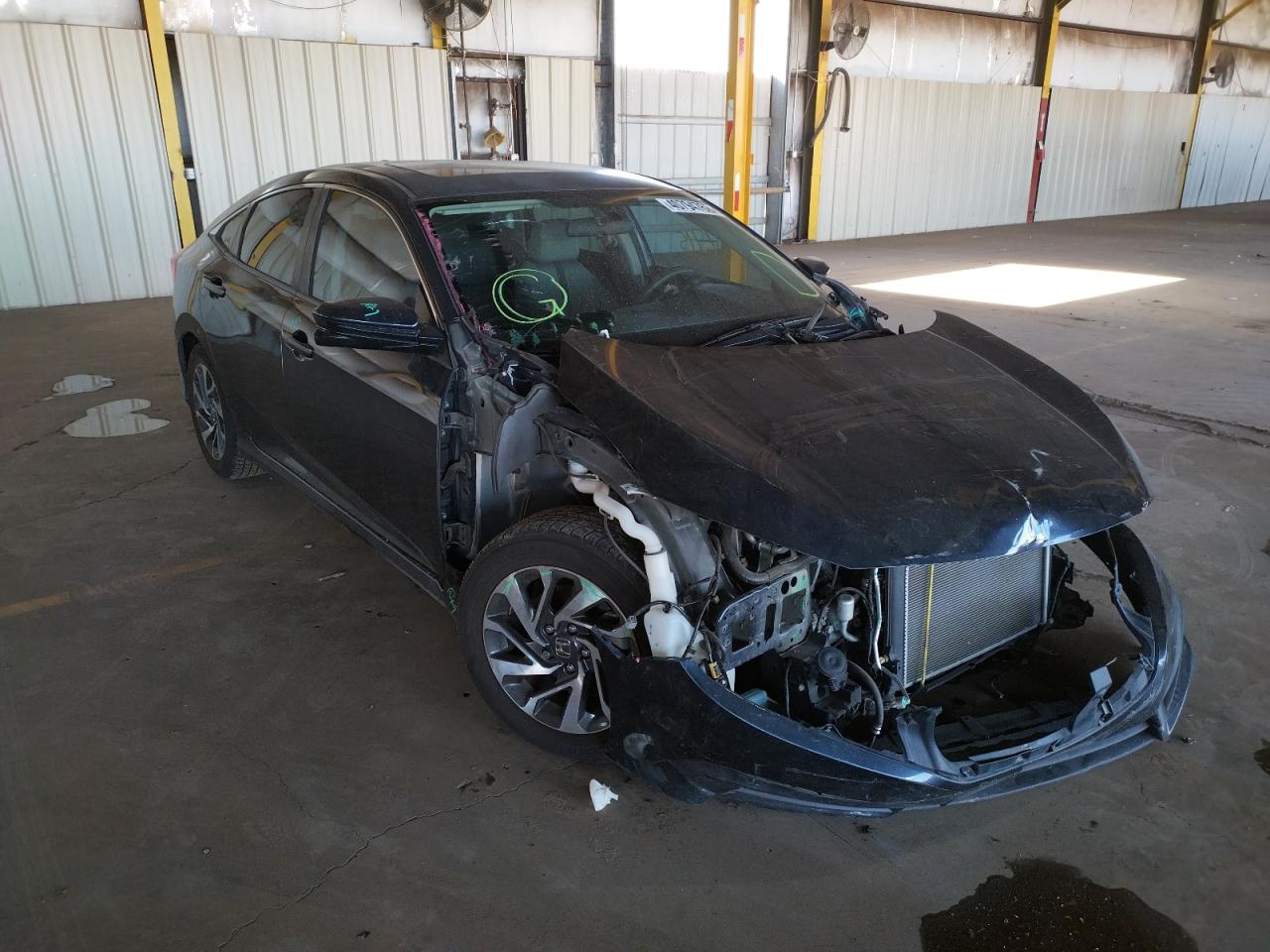 HONDA CIVIC EX 2017 with VIN 19XFC2F74HE006131 - Photo from auction