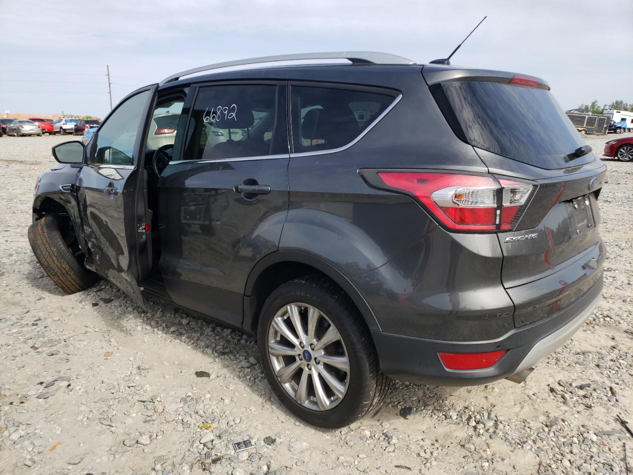 Photo 13 from auction – 2017 FORD ESCAPE TIT with VIN 1FMCU9J91HUB48399