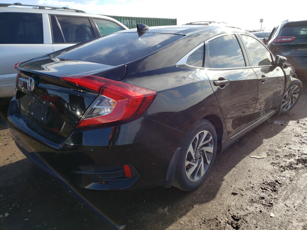 Photo 4 from auction – 2018 HONDA CIVIC EX with VIN 19XFC2F76JE032509