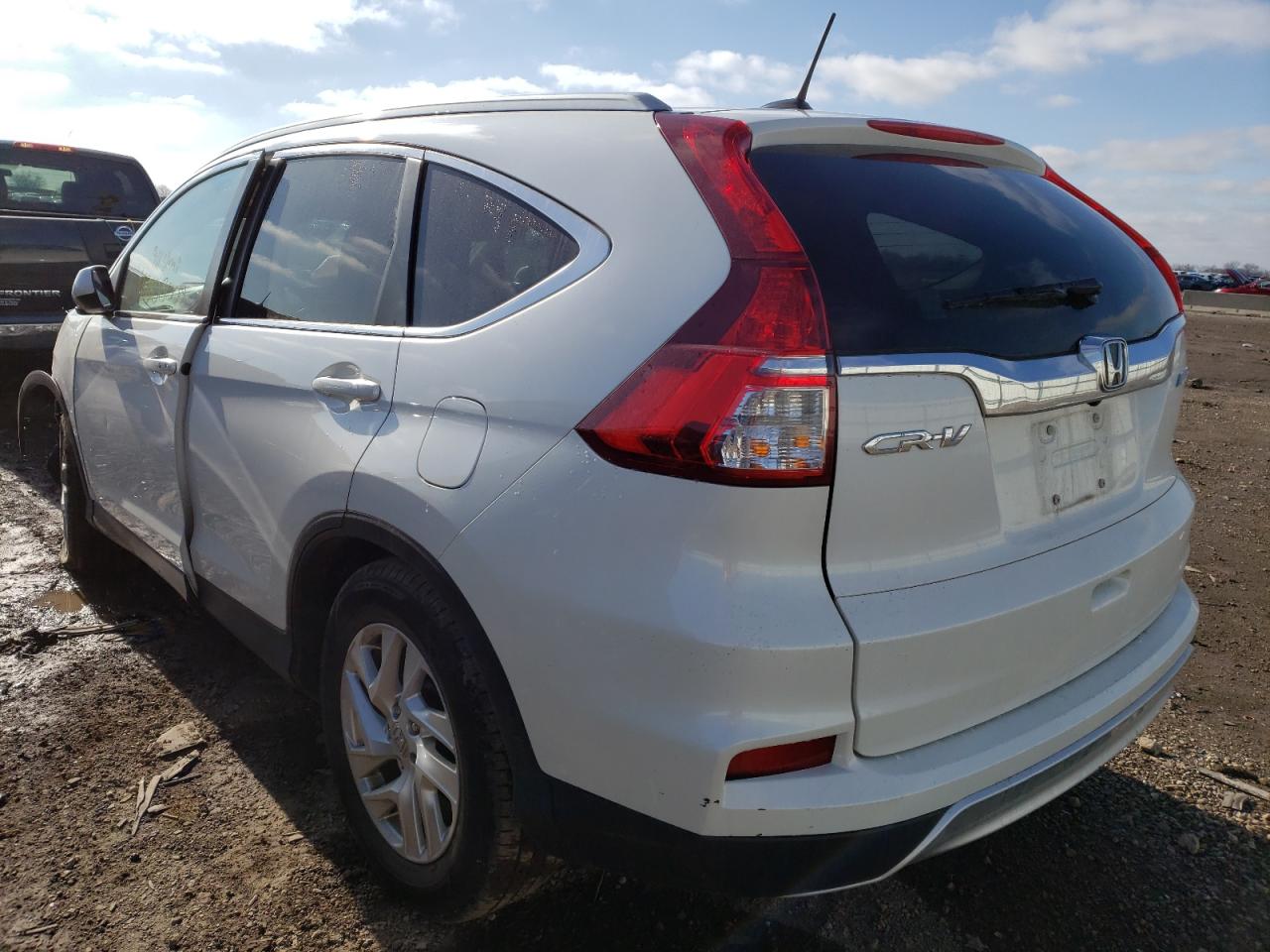 Photo 3 from auction – 2016 HONDA CR-V EXL with VIN 5J6RM4H79GL069485