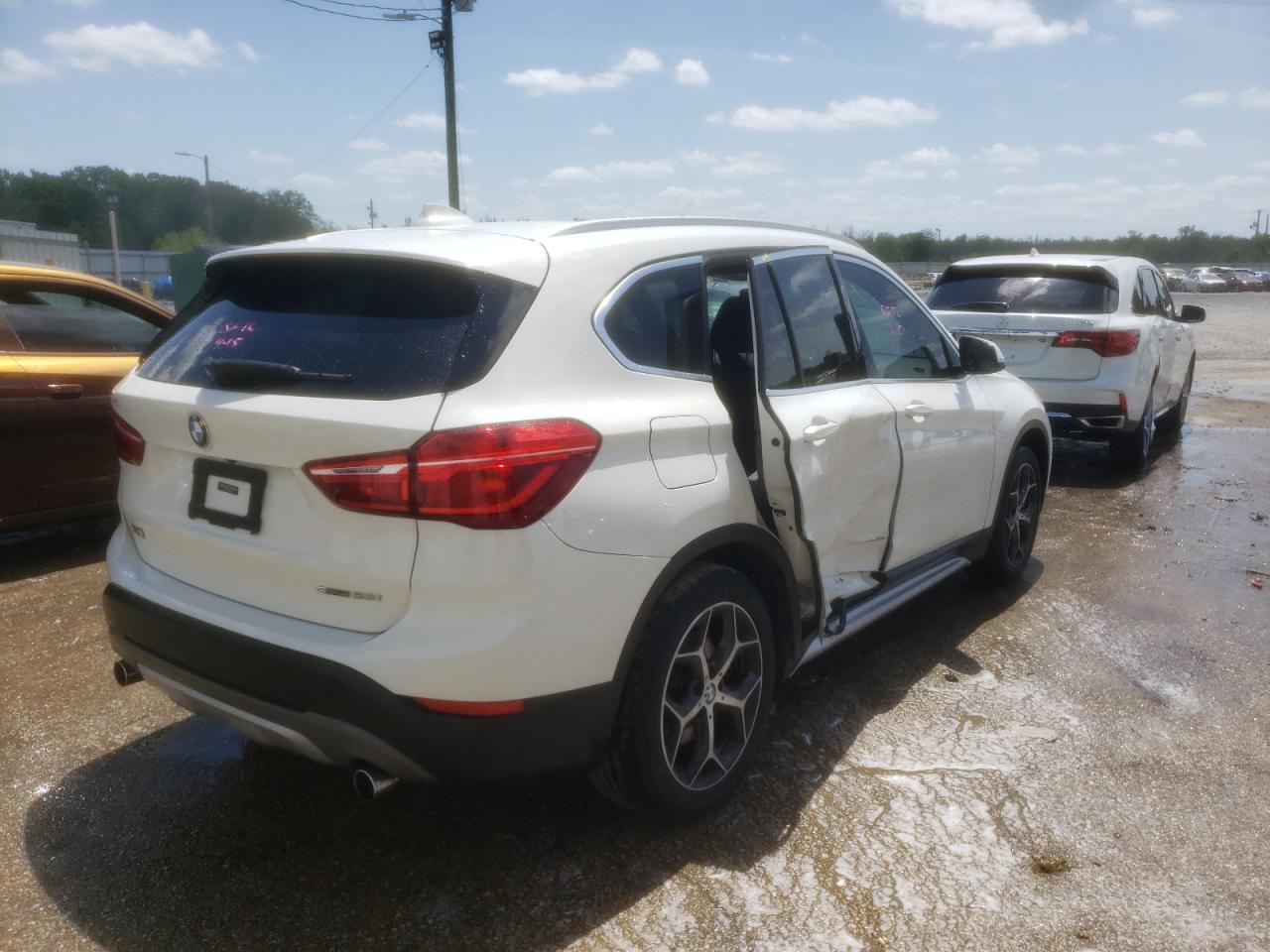 Photo 4 from auction – 2018 BMW X1 SDRIVE2 with VIN WBXHU7C35J5L07645
