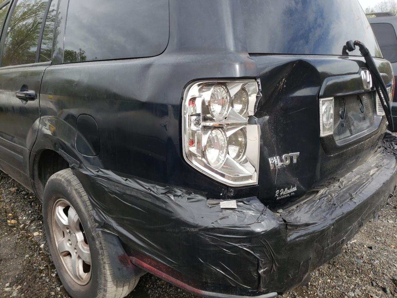 Photo 9 from auction – 2006 HONDA PILOT EX with VIN 2HKYF18636H510354