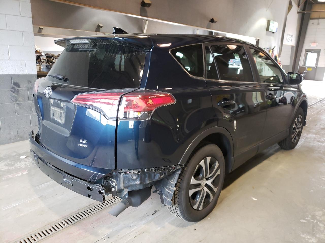 Photo 4 from auction – 2018 TOYOTA RAV4 LE with VIN JTMBFREV2JJ241053