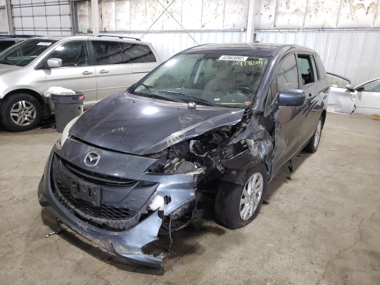 Photo 2 from auction – 2012 MAZDA 5 with VIN JM1CW2BL2C0102659