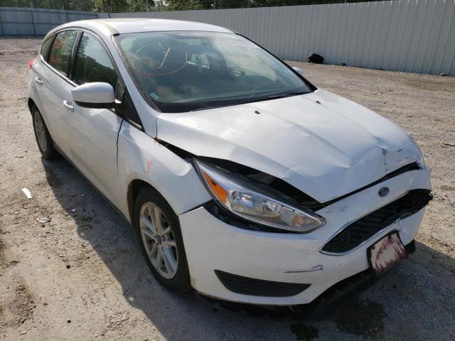 FORD FOCUS SE 2018 with VIN 1FADP3K27JL218309 - Photo from auction