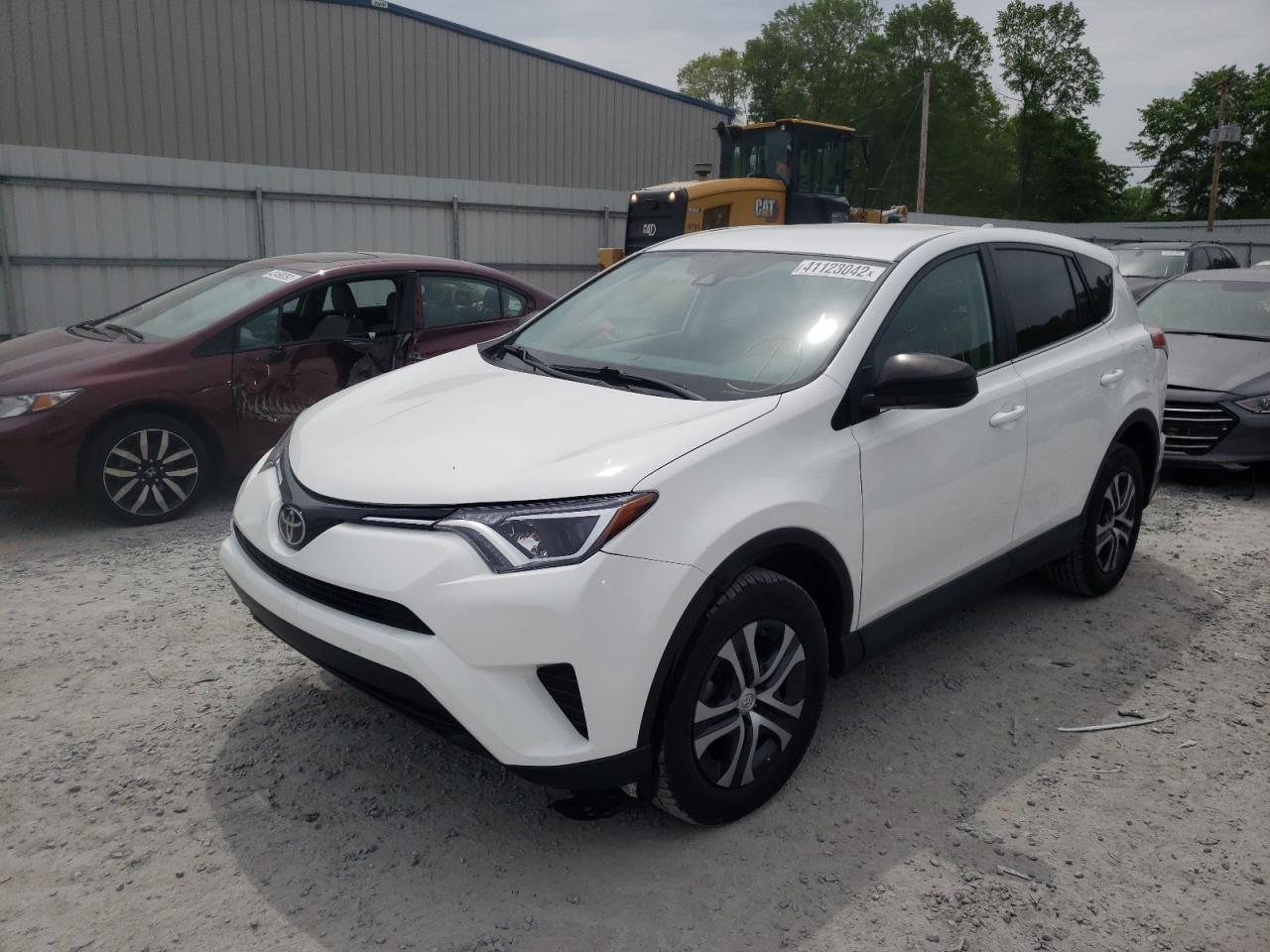 Photo 2 from auction – 2018 TOYOTA RAV4 LE with VIN 2T3ZFREV6JW459576