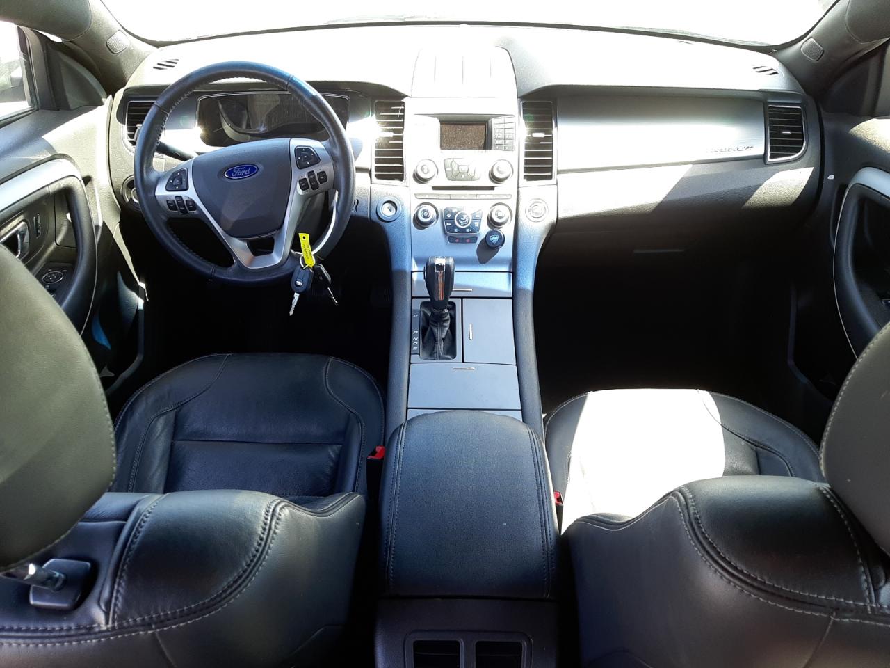 Photo 9 from auction – 2014 FORD TAURUS SEL with VIN 1FAHP2E81EG171465