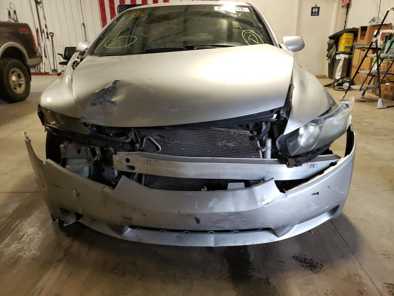 Photo 9 from auction – 2011 HONDA CIVIC LX with VIN 19XFA1F55BE031092