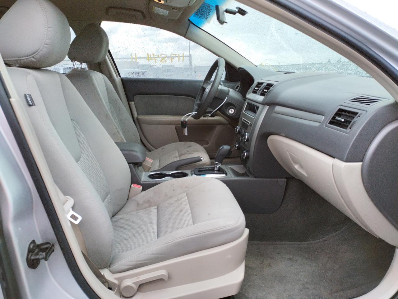 Photo 5 from auction – 2011 FORD FUSION S with VIN 3FAHP0GA5BR122049