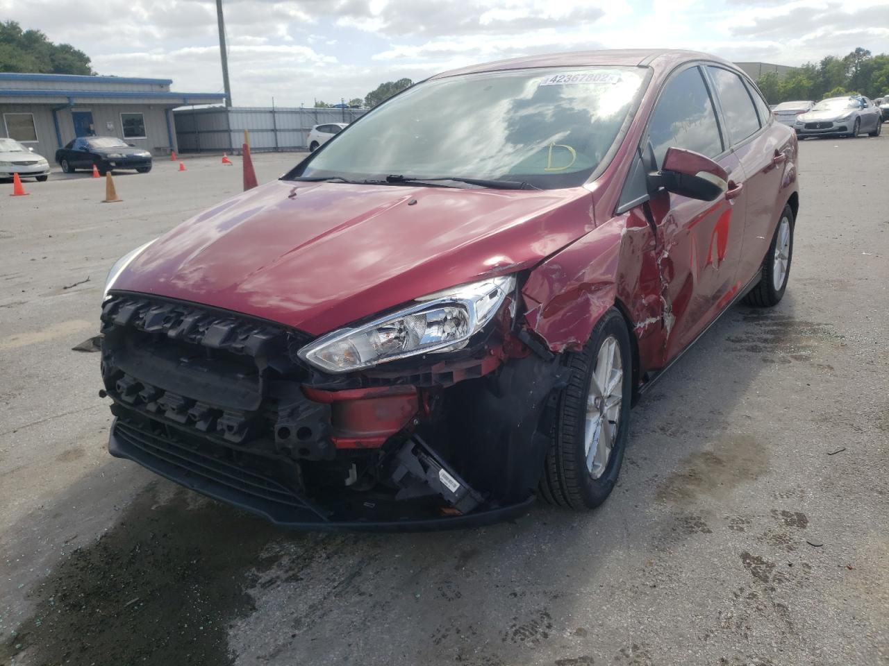 Photo 2 from auction – 2016 FORD FOCUS SE with VIN 1FADP3F29GL300741