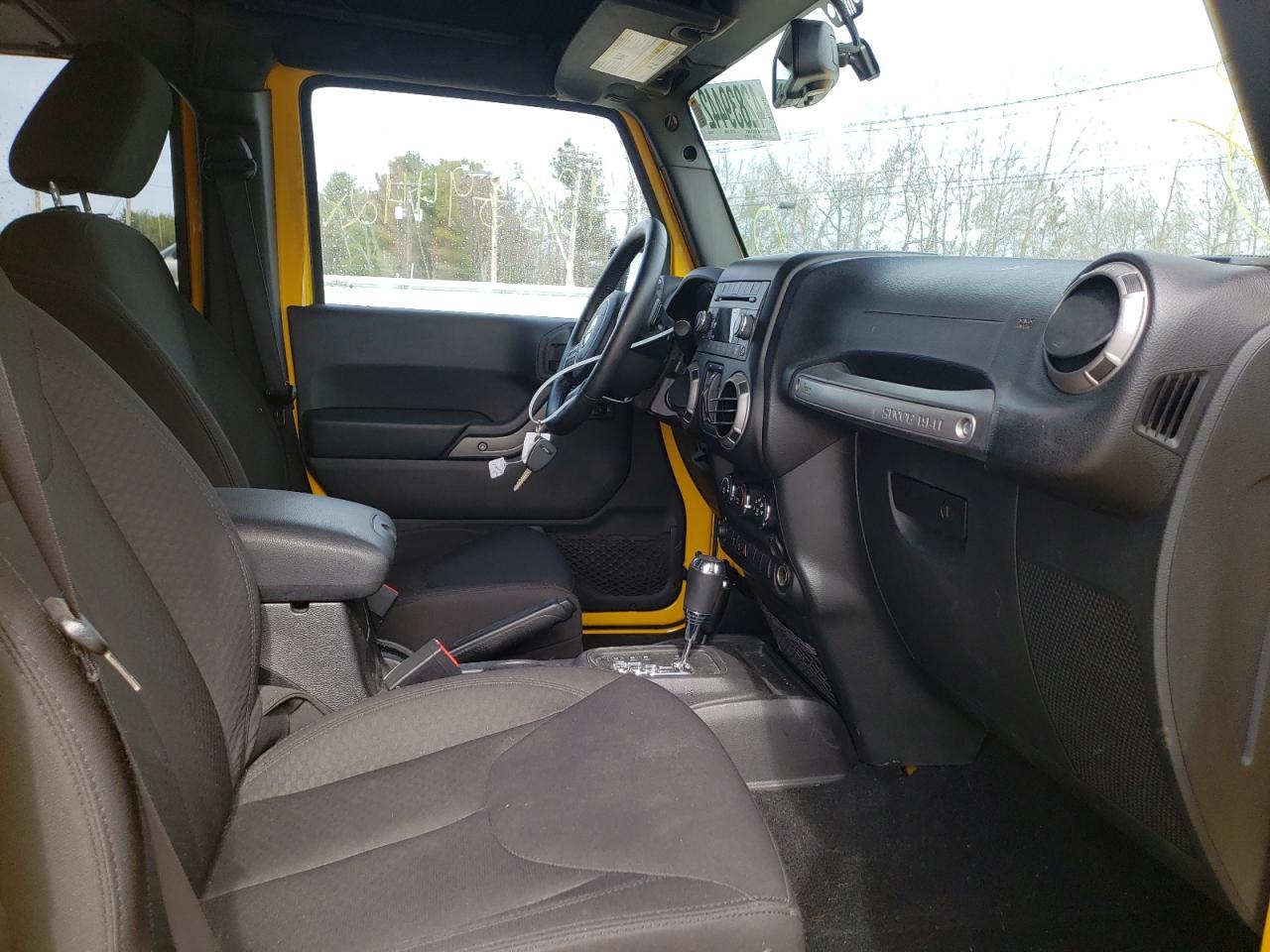 Photo 5 from auction – 2015 JEEP WRANGLER U with VIN 1C4BJWDG7FL654372