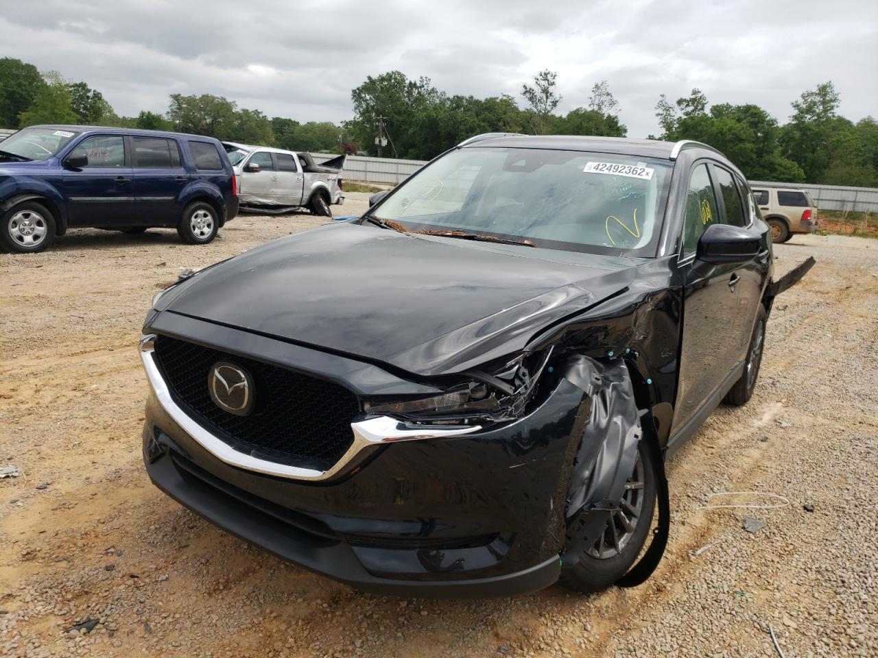 Photo 2 from auction – 2021 MAZDA CX-5 TOURI with VIN JM3KFACM5M0405408